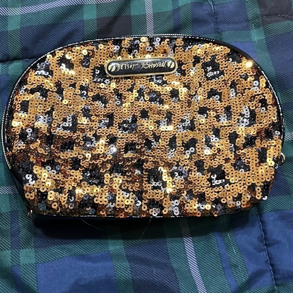 Betsey Johnston gold and black sequined cosmetic bag. Good condition